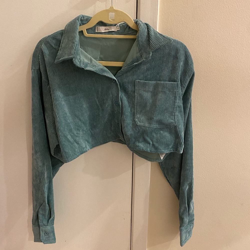 adika green sweater